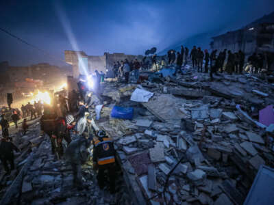 A view of debris of a collapsed building after 7.4 magnitude Kahramanmaras earthquake shook Idlib, Syria, on February 6, 2023.