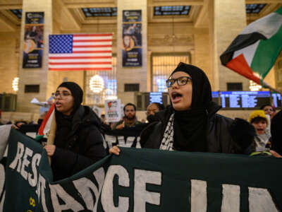 Pro-Palestine activists attend a rally at Grand Central Terminal in New York on January 21, 2022.