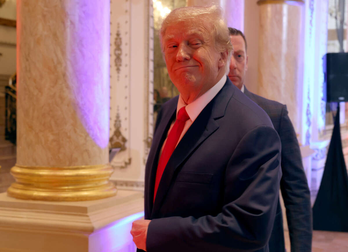 Former President Donald Trump walks away after speaking to the media during an election night event at Mar-a-Lago on November 8, 2022, in Palm Beach, Florida.