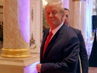 Former President Donald Trump walks away after speaking to the media during an election night event at Mar-a-Lago on November 8, 2022, in Palm Beach, Florida.