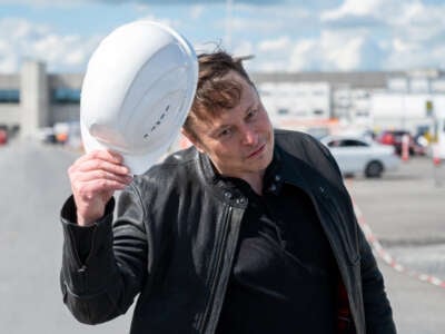Elon Musk, Tesla CEO, stands on the construction site of a Tesla factory in Brandenburg, Germany, on May 17, 2021.