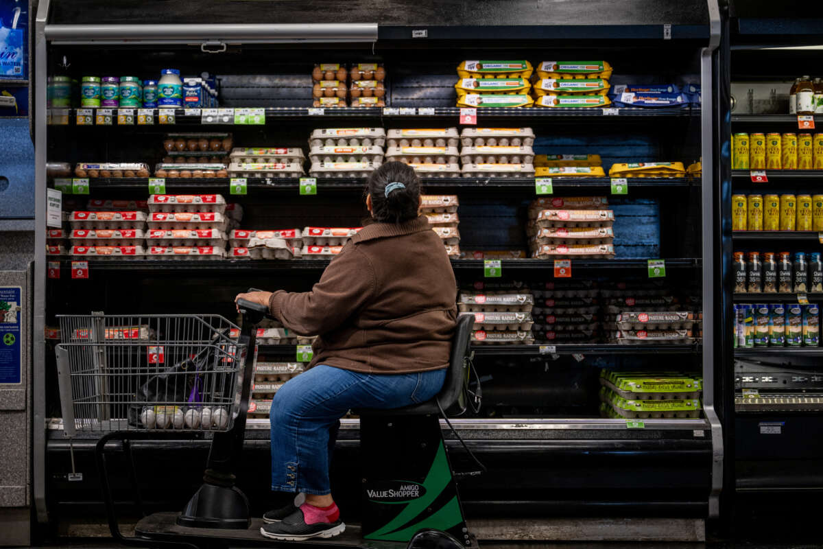 A customer shops for eggs at a Sprouts Farmers Market on February 8, 2023, in Austin, Texas.