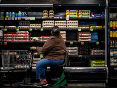A customer shops for eggs at a Sprouts Farmers Market on February 8, 2023, in Austin, Texas.