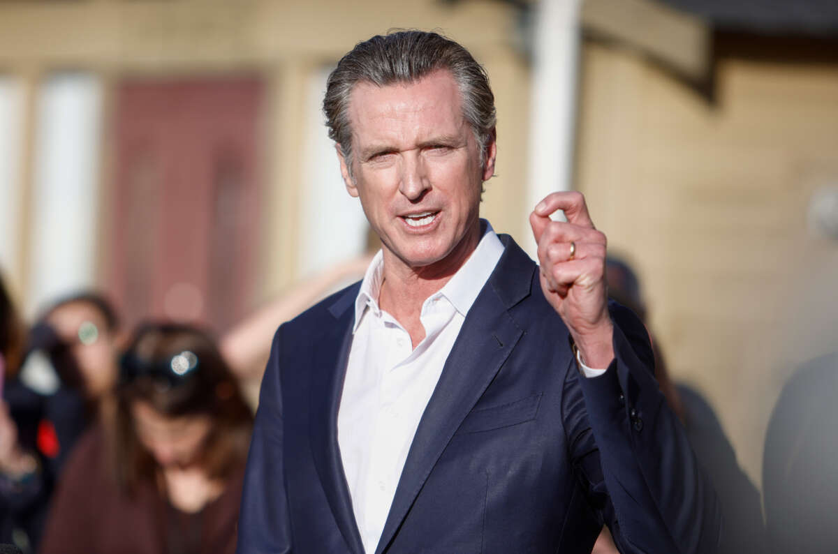 Gov. Gavin Newsom speaks during a press conference at the reunification center in Half Moon Bay, California, on January 24, 2023.