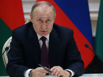 Russian President Vladimir Putin speaks during a press conference at the Palace of Independence on December 19, 2022, in Minsk, Belarus.