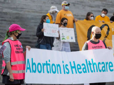 People rally in support of abortion access at the South Carolina State House on February 17, 2022.