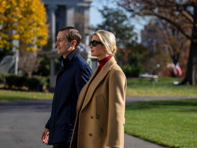 Senior Advisors to the President Jared Kushner and Ivanka Trump walk on the south lawn of the White House on November 29, 2020, in Washington, D.C.