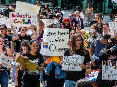 A group of Florida International University students, staff and community members participate in the Fight for Florida Students and Workers protest against Gov. Ron DeSantis's recent actions to remake higher education at state universities and colleges, on February 23, 2023, in Miami.