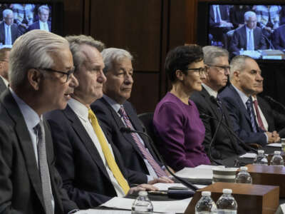 (L-R) Wells Fargo CEO Charles Scharf, Bank of America CEO Brian Thomas Moynihan, JPMorgan Chase & Co CEO Jamie Dimon, Citigroup CEO Jane Fraser, Truist Financial Corporation CEO William Rogers, and U.S. Bancorp CEO Andy Cecere testify during a Senate Banking, Housing, and Urban Affairs Committee hearing on Capitol Hill in Washington, D.C., on September 22, 2022.