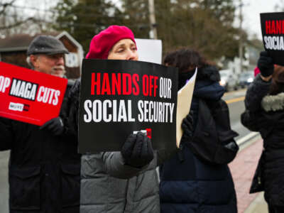 Dennis Dunne and Aileen Kirshoff attend a rally against cuts to social security on February 23, 2023 in Huntington, New York.