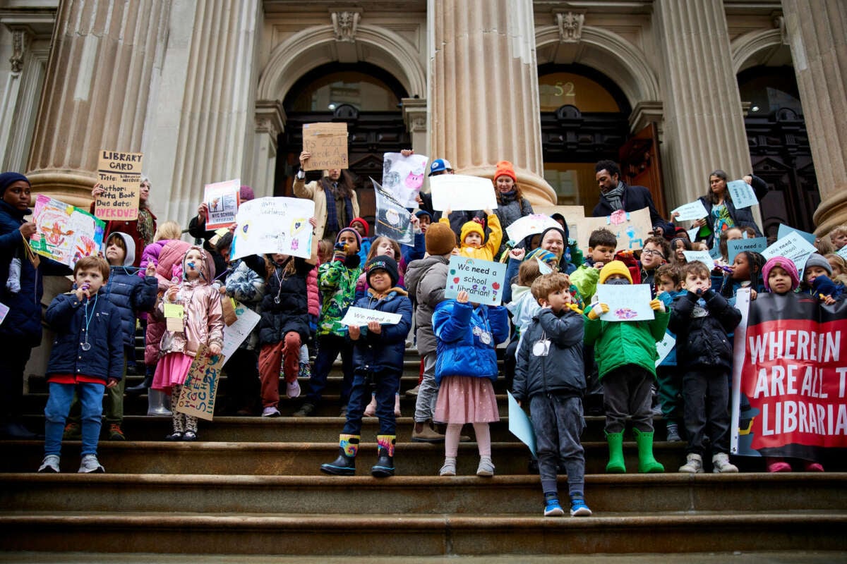 Students rally on the steps of the New York City Department of Education, demanding a librarian for their school and all other NYC public school students.
