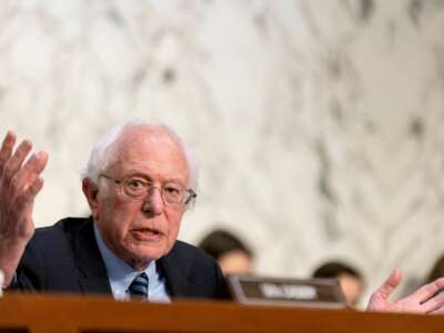 Sen. Bernie Sanders speaks to Stephane Bancel, CEO and director of Moderna, Inc., during the Senate Health, Education, Labor, and Pensions Committee on the price of Covid vaccines, on Capitol Hill in Washington, D.C., on March 22, 2023.