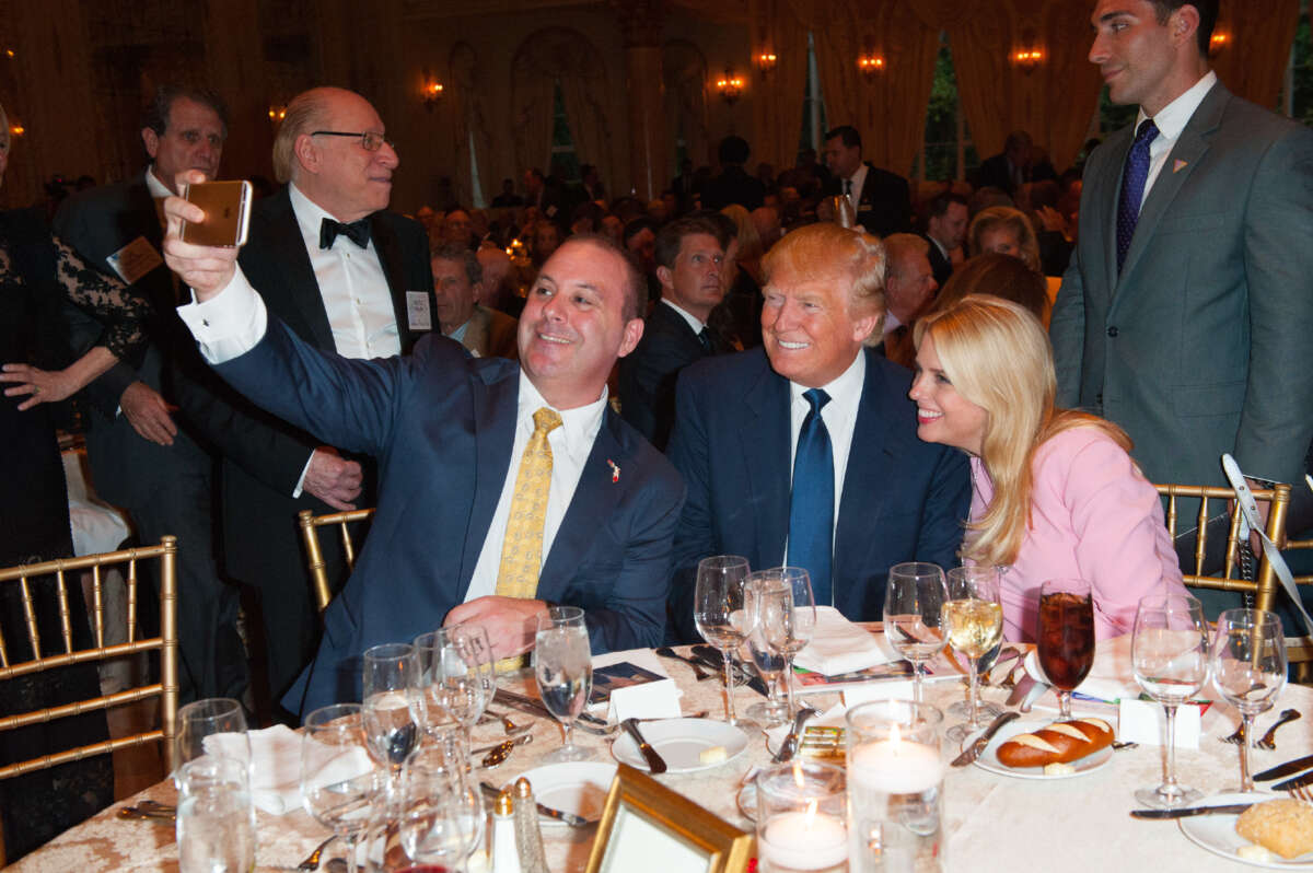 Blaise Ingoglia, who would go on to file SB 1248, takes a selfie with Donald Trump and Pam Bondi at the Palm Beach Lincoln Day Dinner at Mar-a-Lago, Palm Beach, Florida, on March 20, 2016.