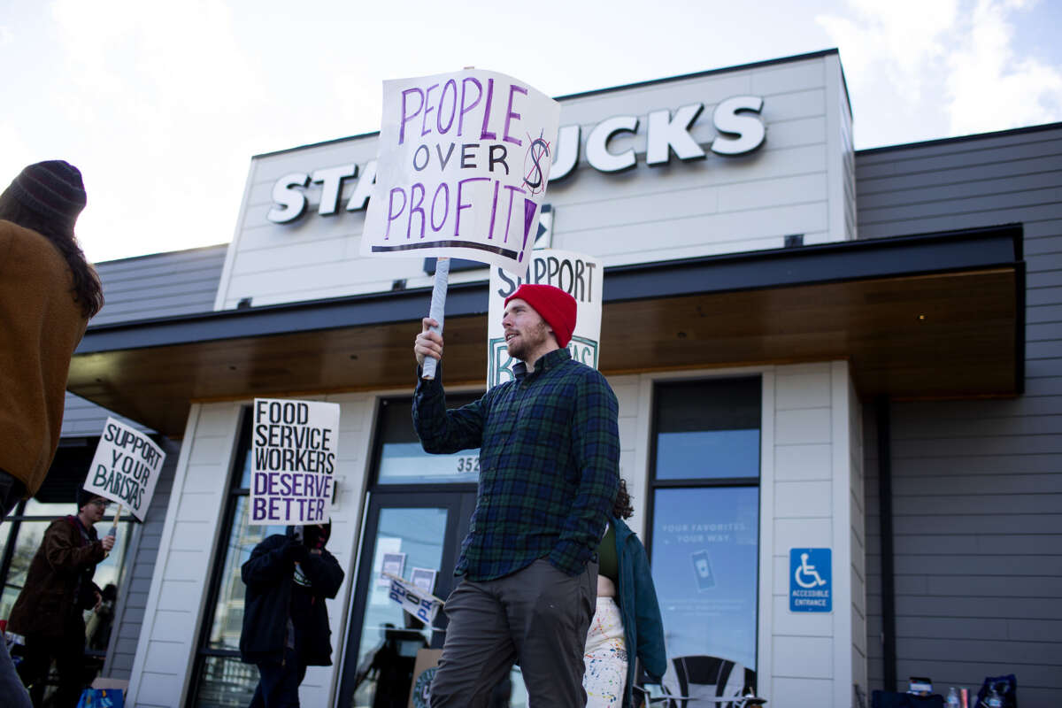 Starbucks workers in Biddeford, Maine, participate in the “Red Cup Rebellion”, a nationwide strike demanding the company fully staff union stores and bargain in good faith, on November 15, 2022.