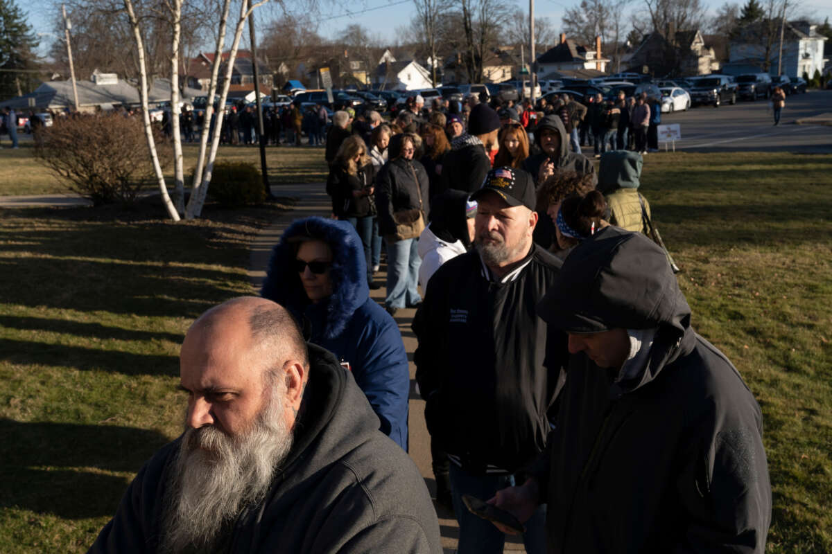 Residents from East Palestine and surrounding areas wait in line for the town hall event held by environmental activist Erin Brockovich on February 24, 2023, in East Palestine, Ohio.