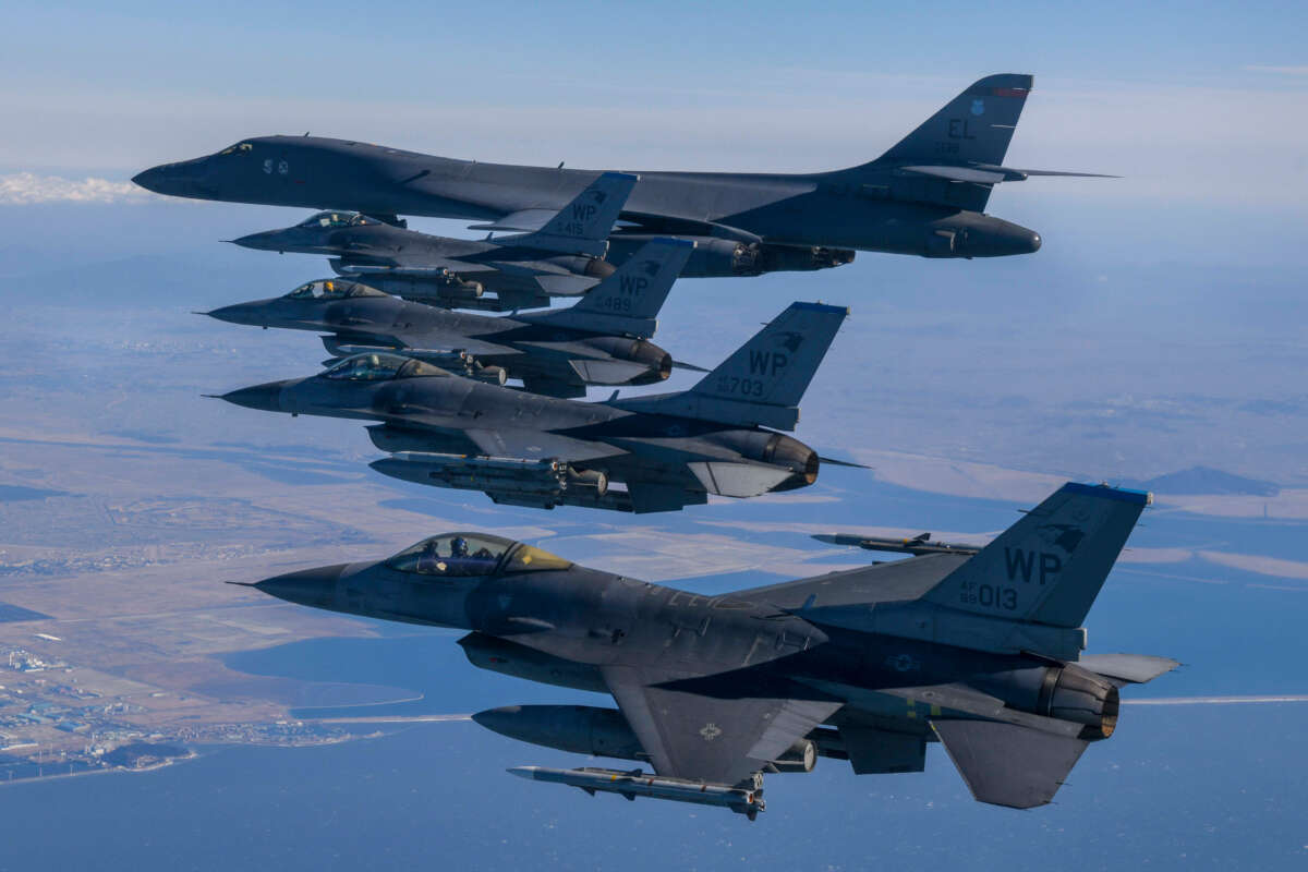 In this handout image released by the South Korean Defense Ministry, a U.S. Air Force B-1B bomber and F-16 fighter jets fly over the South Korea Peninsula during a joint air drill on February 19, 2023, at an undisclosed location in South Korea.