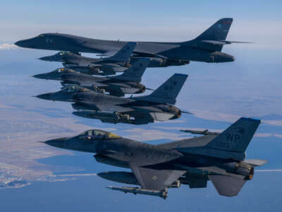 In this handout image released by the South Korean Defense Ministry, a U.S. Air Force B-1B bomber and F-16 fighter jets fly over the South Korea Peninsula during a joint air drill on February 19, 2023, at an undisclosed location in South Korea.