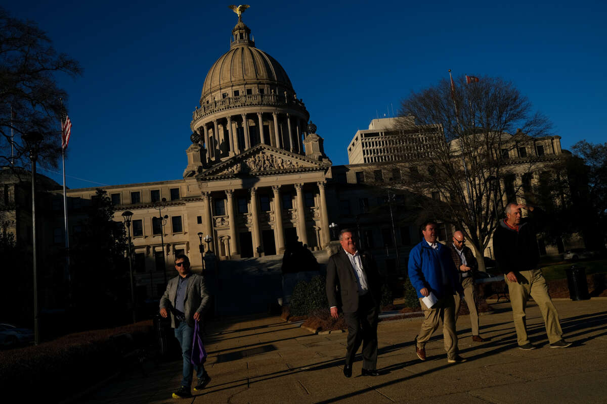 People walks outside the Mississippi State Capitol on February 8, 2023, in Jackson, Mississippi.