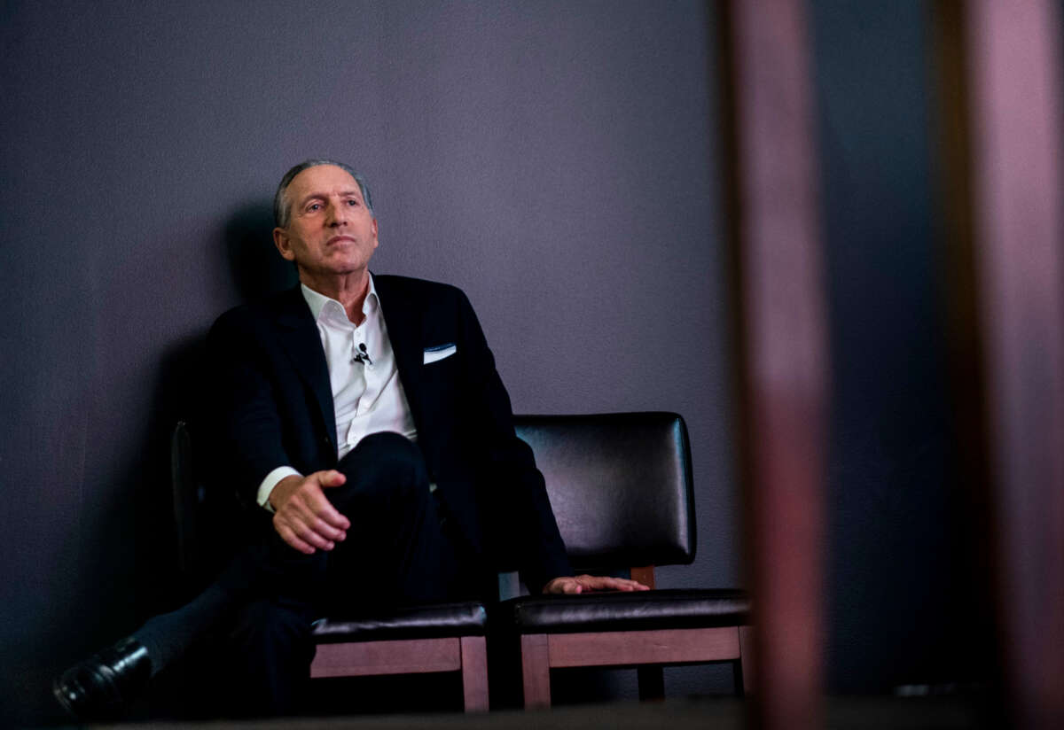 CEO of Starbucks Howard Schultz sits off stage to listen to soon-to-be Starbucks CEO Laxman Narasimhan at Investor Day in Seattle, Washington, on September 13, 2022.