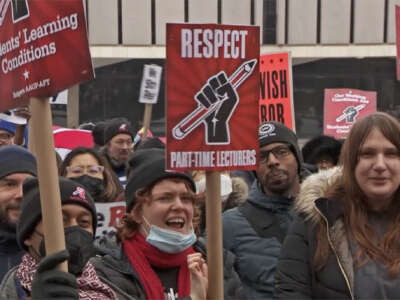 Demonstrators rally outside the Rutgers Board of Governors meeting in Newark, New Jersey, on February 28, 2023.