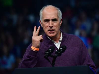 Sen. Bob Casey addresses supporters during a rally at the Liacouras Center on November 5, 2022, in Philadelphia, Pennsylvania.