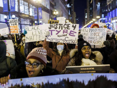 People march on State Street in Chicago's Loop on January 30, 2023, to protest the police killing of Tyre Nichols.