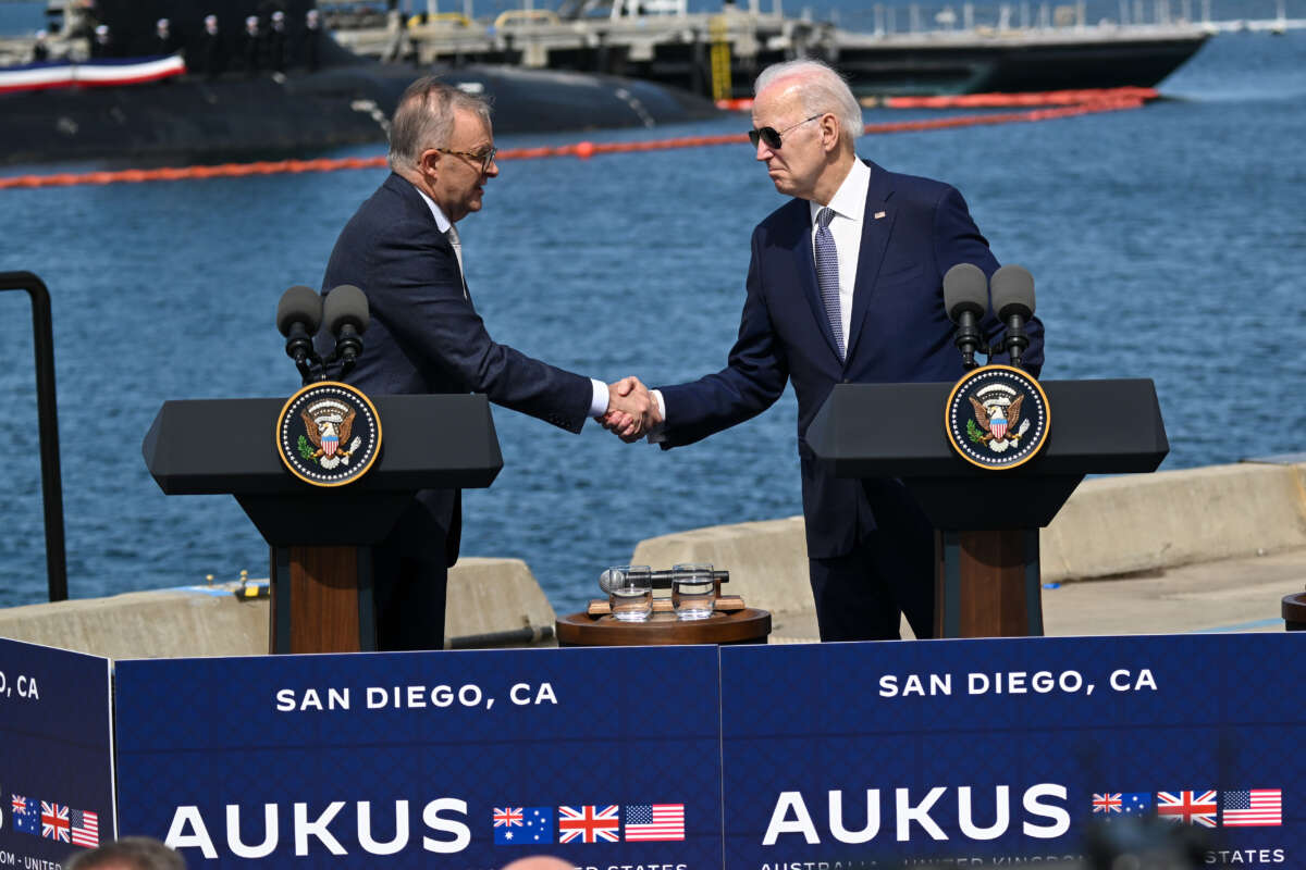 President Joe Biden (right) and Prime Minister Anthony Albanese of Australia shake hands during the AUKUS Partnership meeting at Naval Base Point Loma in San Diego, California, on March, 13, 2023.