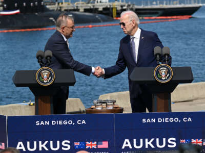 President Joe Biden (right) and Prime Minister Anthony Albanese of Australia shake hands during the AUKUS Partnership meeting at Naval Base Point Loma in San Diego, California, on March, 13, 2023.