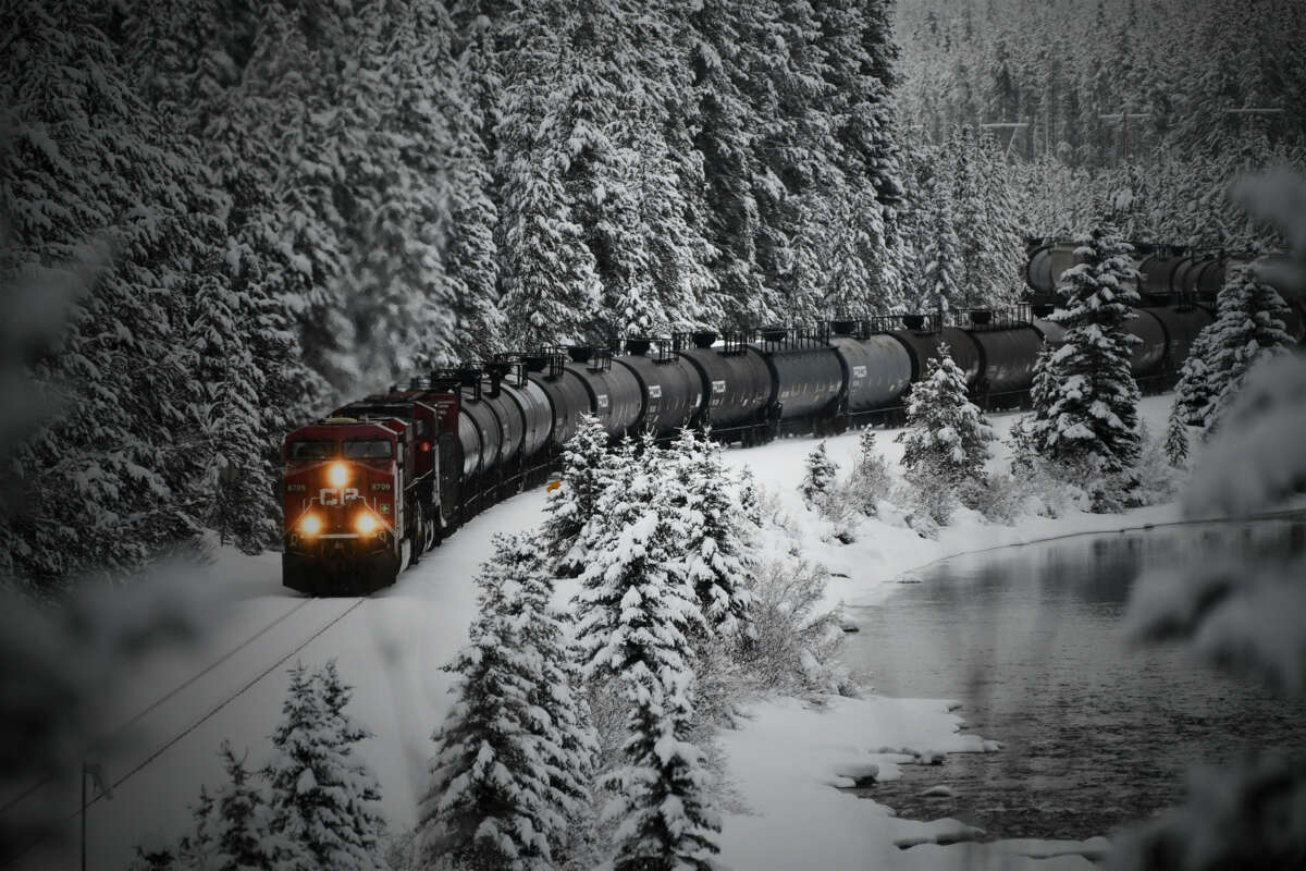 A Canadian Pacific railway locomotive and cars seen near Lake Louise in Banff National Park, Alberta, Canada on November 26, 2021.