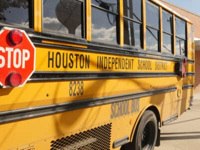 A school bus is seen outside Condit Elementary School in Bellaire, outside Houston, Texas, on December 16, 2020.