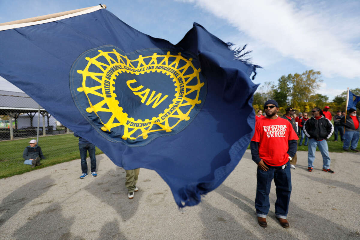 United Auto Workers union members and their families rally near the General Motors Flint Assembly plant on Solidarity Sunday on October 13, 2019, in Flint, Michigan.