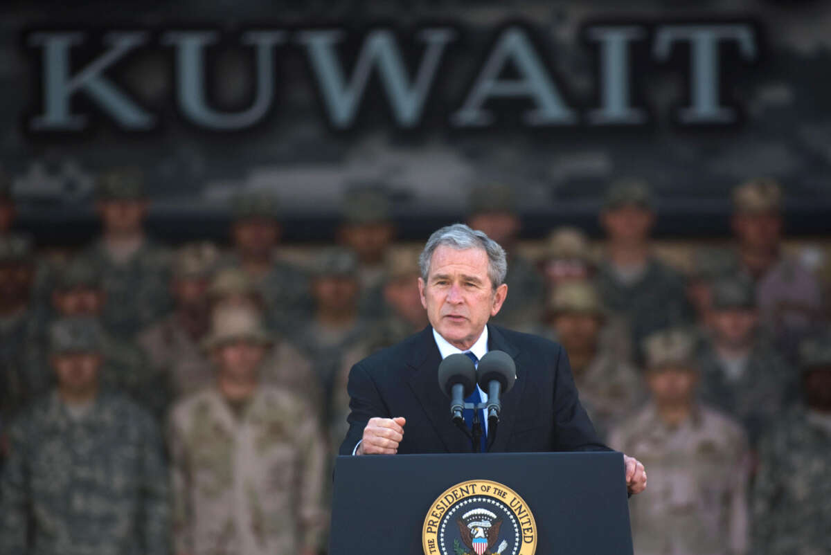 President George W. Bush addresses military personnel and coalition forces at U.S. Camp Arifjan, 35 miles south of Kuwait City, on January 12, 2008.