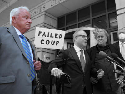 Robert J. Costello (left), lawyer to Steve Bannon (2nd from right) and Rudy Giuliani, appears outside the E. Barrett Prettyman U.S. Courthouse on June 15, 2022, in Washington, D.C.