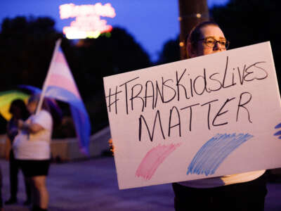 Transgender rights advocates rally outside the Ohio Statehouse in Colombus on June 24, 2021.