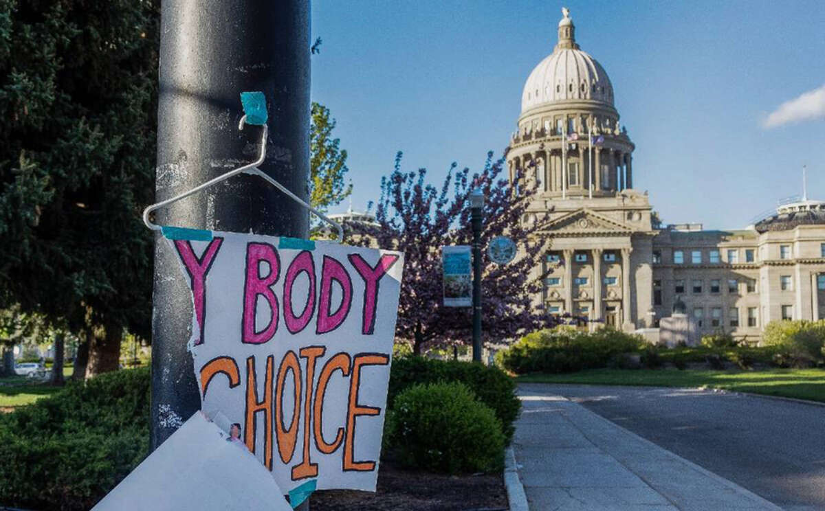 A sign taped to a hanger hangs near the Idaho Capitol in Boise after protests against the state's new abortion laws, which effectively banned the procedure, pictured on November 11, 2022.