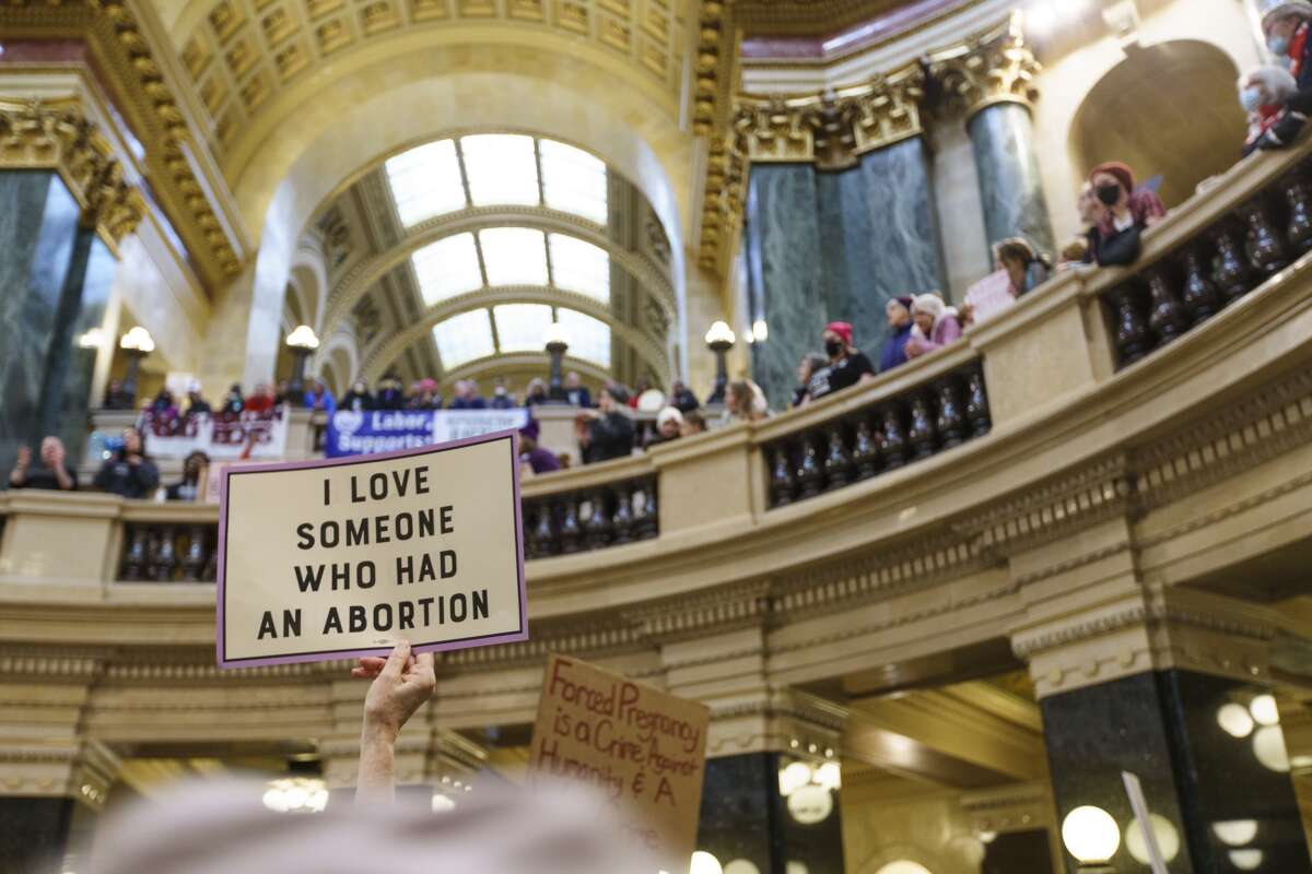 Abortion rights supporters rally in the rotunda of the Wisconsin State Capital in Madison, on January 22, 2022.