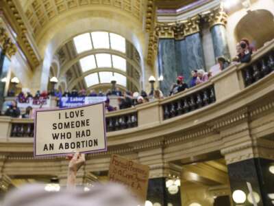 Abortion rights supporters rally in the rotunda of the Wisconsin State Capital in Madison, on January 22, 2022.