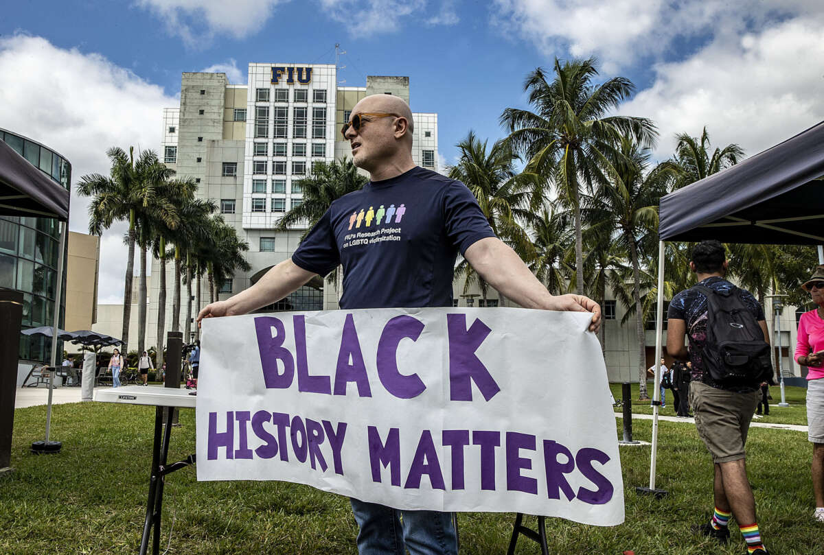 A Florida International University professor, joined a group of the University students, staff and community members during the 'Fight for Florida Students and Workersâ' protest against Gov. Ron DeSantis on February 23, 2023.