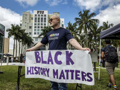 A Florida International University professor, joined a group of the University students, staff and community members during the 'Fight for Florida Students and Workersâ' protest against Gov. Ron DeSantis on February 23, 2023.