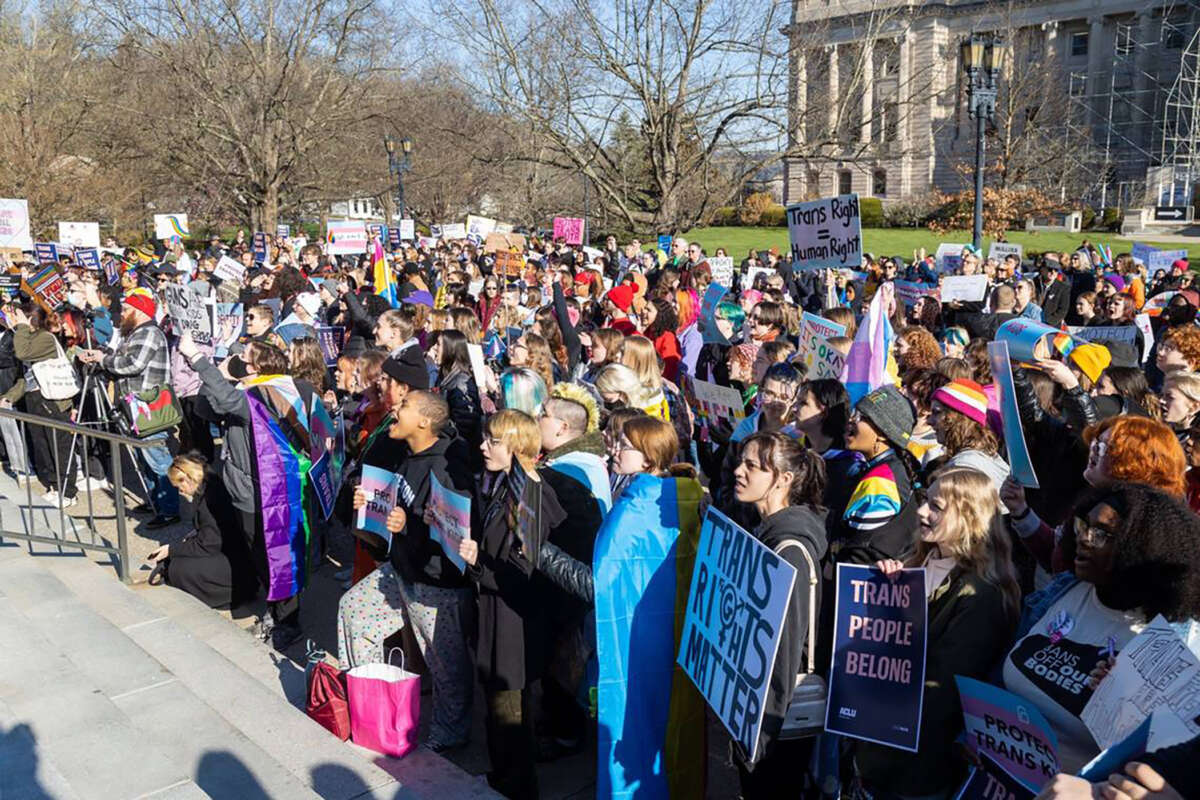 Teens from various areas of Kentucky gather in front of the Kentucky Capitol Annex building on March 29, 2023, to protest against SB150, which would ban gender-affirming health care for transgender teens.