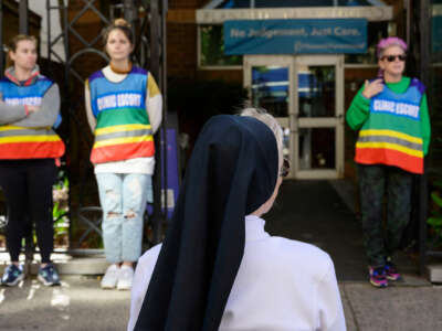 An anti-abortion nun is seen praying in front of a Planned Parenthood Health Center in Philadelphia, Pennsylvania, on September 28, 2022.