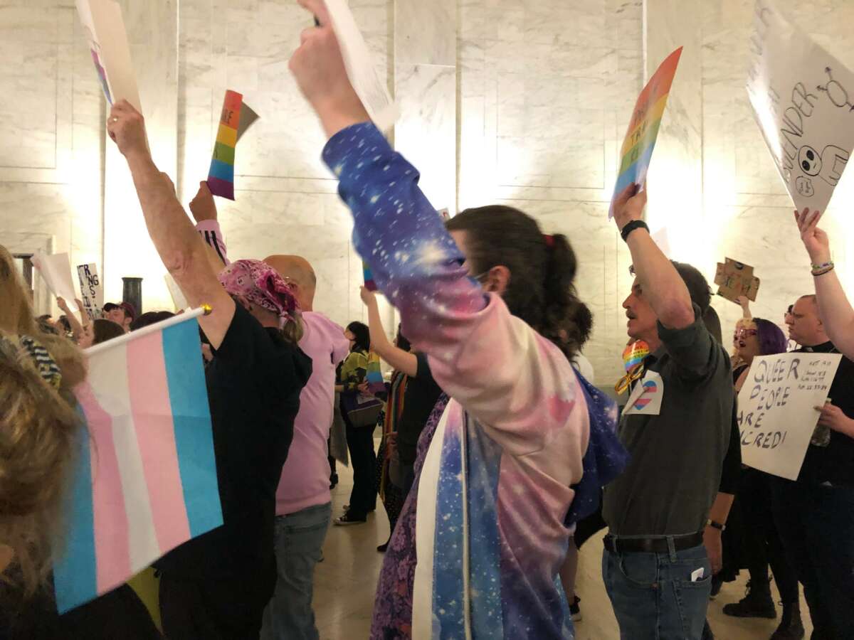 Advocates for transgender rights pack the West Virginia state capitol in Charleston, West Virginia, on March 9, 2023.