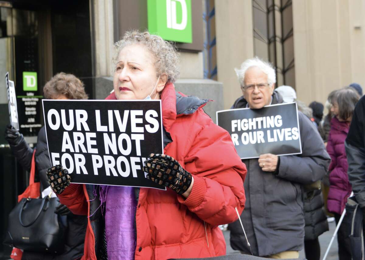 Retirees and active union members protest during the New York City’s Municipal Labor Committee vote on March 9, 2023.