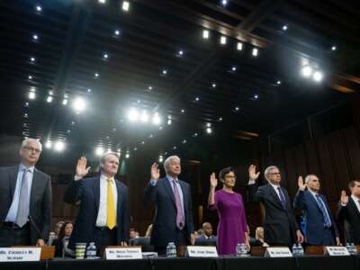 (L-R) Charles Scharf, CEO and President of Wells Fargo, Brian Thomas Moynihan, Chairman and CEO of Bank of America, Jamie Dimon, Chairman and CEO of JPMorgan Chase, Jane Fraser, CEO of Citigroup, William H. Rogers Jr., Chairman and CEO of Truist Financial Corporation, Andy Cecere, Chairman, President, and CEO of US Bancorp, and William Demchak, Chairman, President, and CEO, of The PNC Financial Services Group, are sworn in as they prepare to testify during a Senate Banking, Housing, and Urban Affairs Committee Hearing on the Annual Oversight of the Nation's Largest Banks, on Capitol Hill in Washington, DC, September 22, 2022.