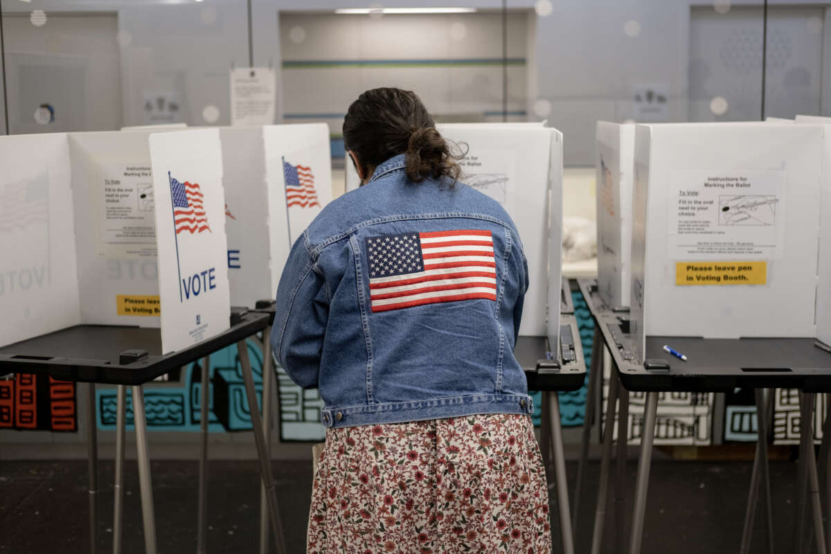 A voter casts their ballot at the Hillel Foundation on November 8, 2022 in Madison, Wisconsin.