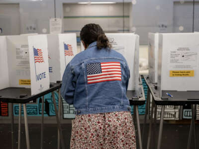 A voter casts their ballot at the Hillel Foundation on November 8, 2022 in Madison, Wisconsin.