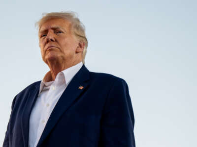 Former U.S. President Donald Trump looks on during a rally at the Waco Regional Airport on March 25, 2023 in Waco, Texas.