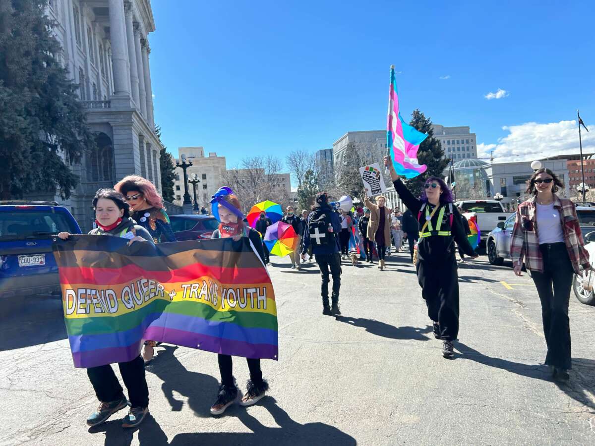 LGBTQ advocates rally at the state capitol in Denver, Colorado, on March 24, 2023.