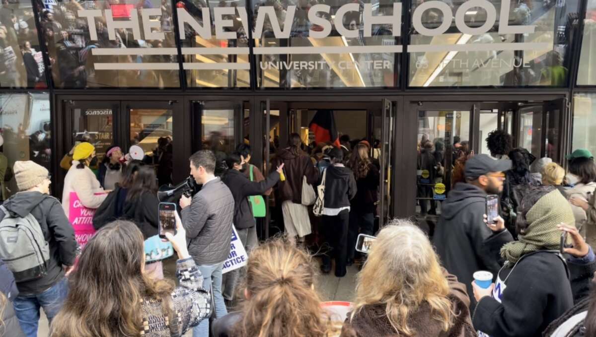 People throng outside the entrance of a building labeled "THE NEW SCHOOL"