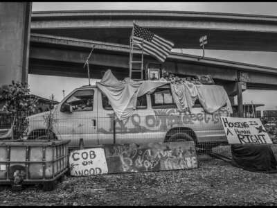 The Wood Street encampment of unhoused people under a freeway and railroad overpass was home to over 300 people, who the city and CalTrans forced to leave. Volunteers helped residents try to resist eviction.